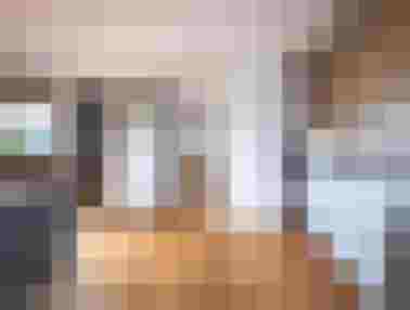 Moderne Ferienwohnung am Hinterburghof mit Küche und Schlafzimmer in Saalfelden.