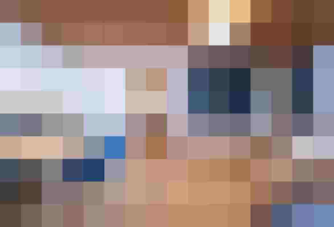 Modernes Wohnzimmer eines Appartements im Hinterburghof, mit Esstisch und TV-Einheit.